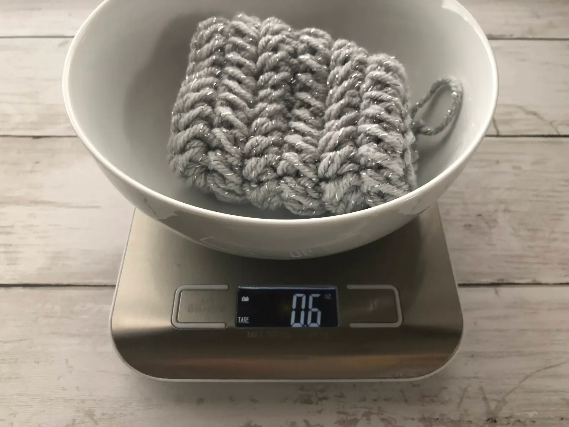 yarn in bowl on scale
