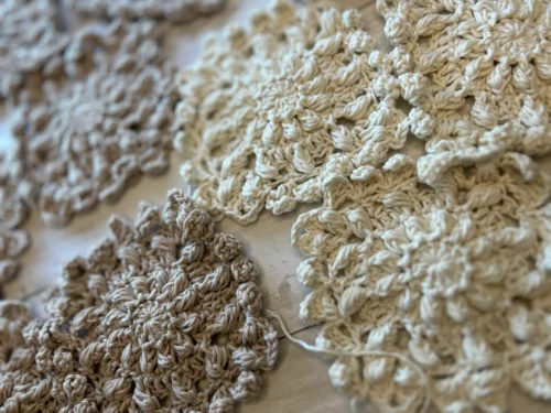 granny squares on a table in beige and cream