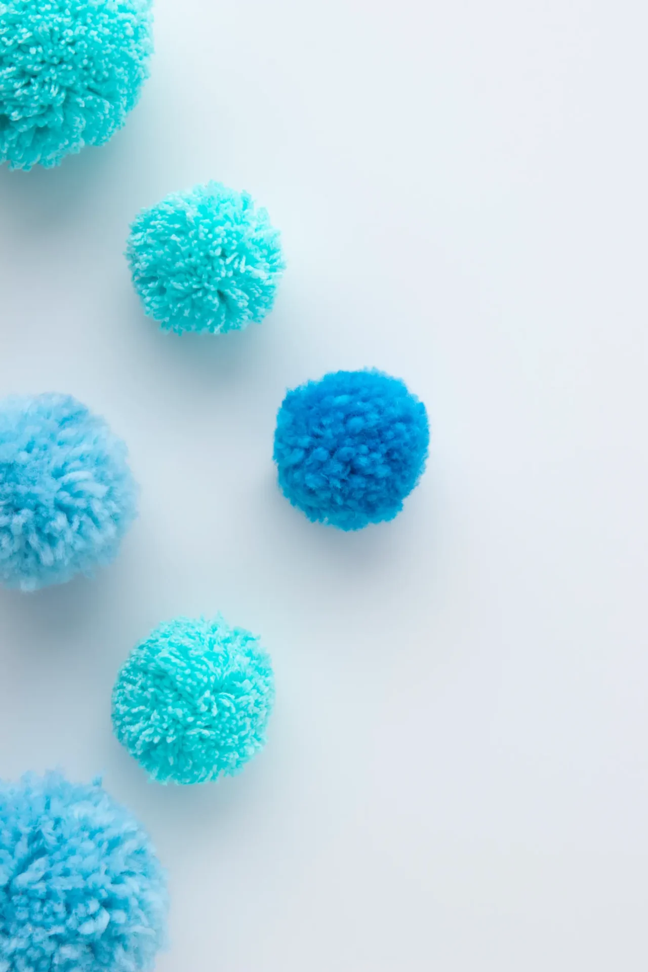 blue pom poms blue pom poms